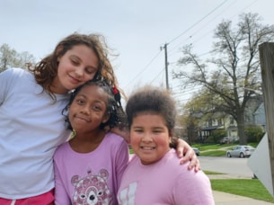 Three Girls on the Run participants smiling at the camera